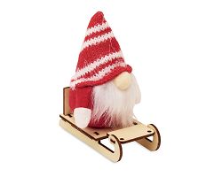 Lutin sur un traîneau en bois