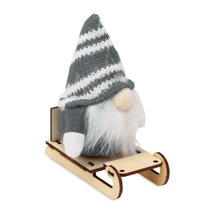  Lutin sur un traîneau en bois