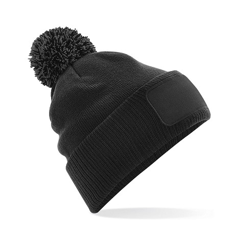 Bonnet à pompon bicolore
