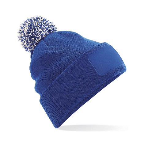 Bonnet à pompon bicolore