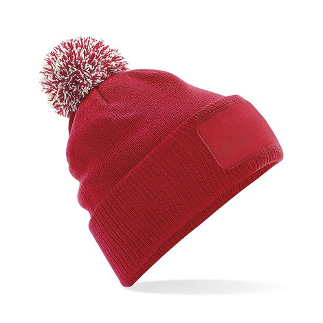 Bonnet à pompon bicolore