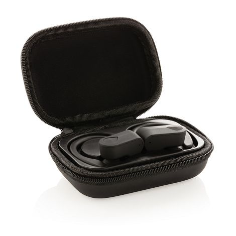 Ecouteurs sport TWS dans son boitier de charge